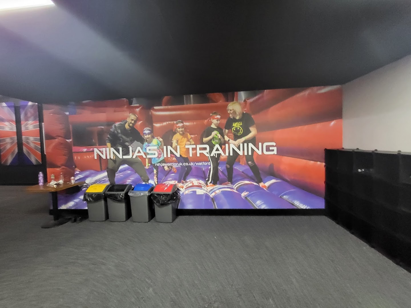 Children training on inflatable obstacles at Ninja Warrior UK Watford