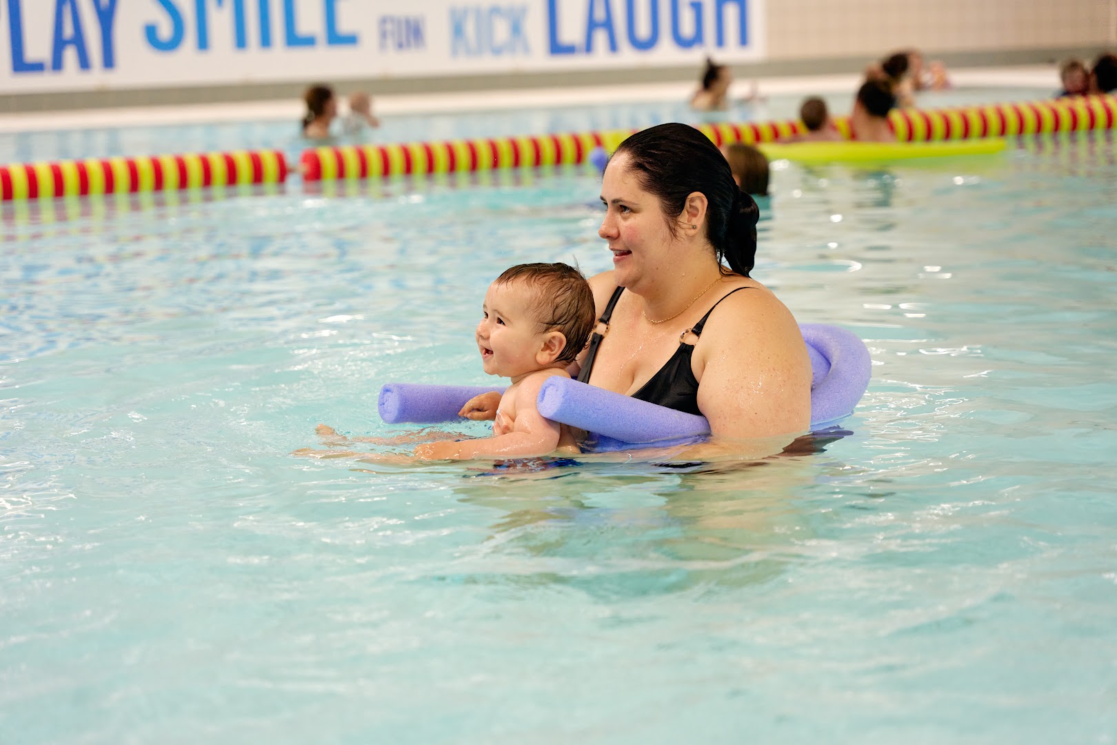 Parent and child enjoying swimming at Waltham Forest Feel Good Centre