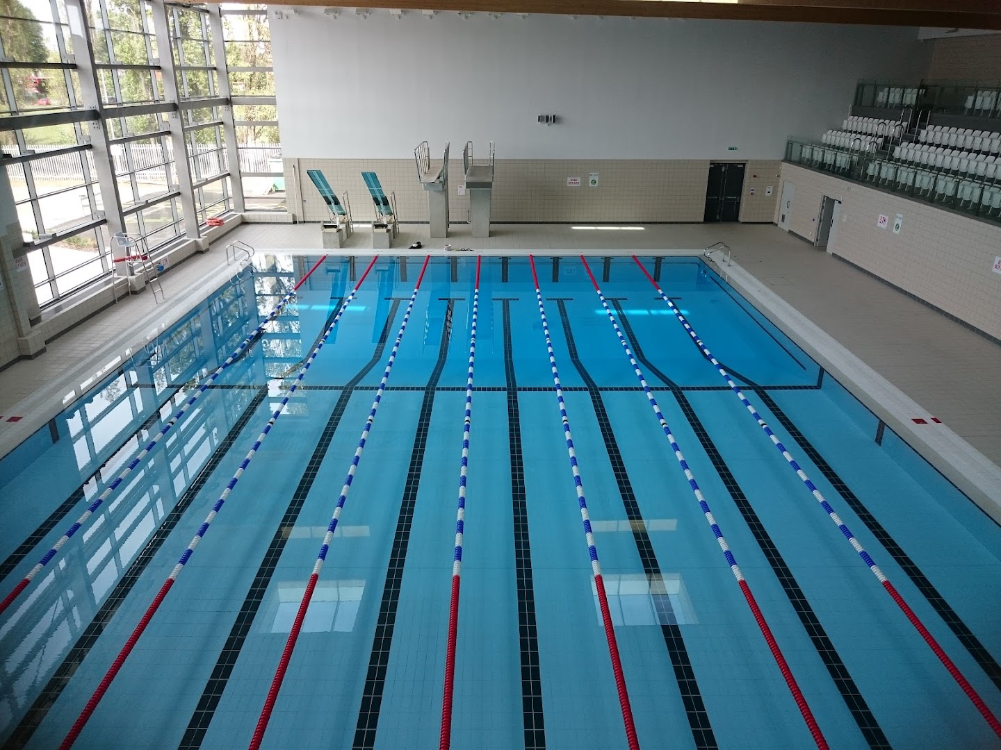 Indoor swimming pool at Waltham Forest Feel Good Centre with lanes and diving boards
