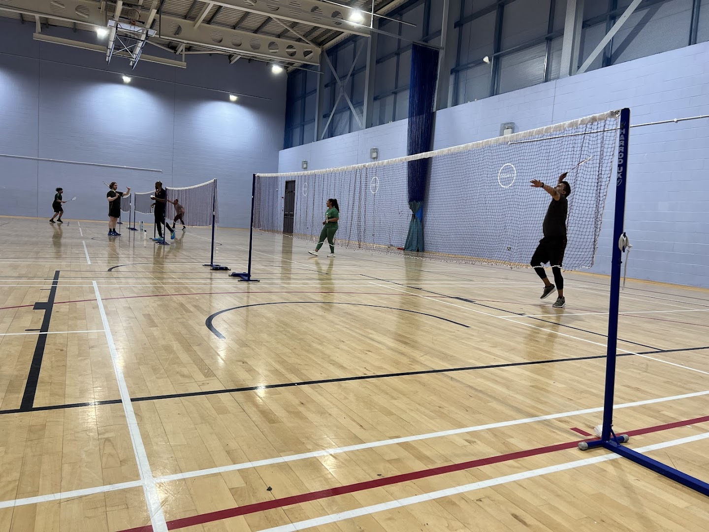 Badminton courts at Waltham Forest Feel Good Centre with children playing