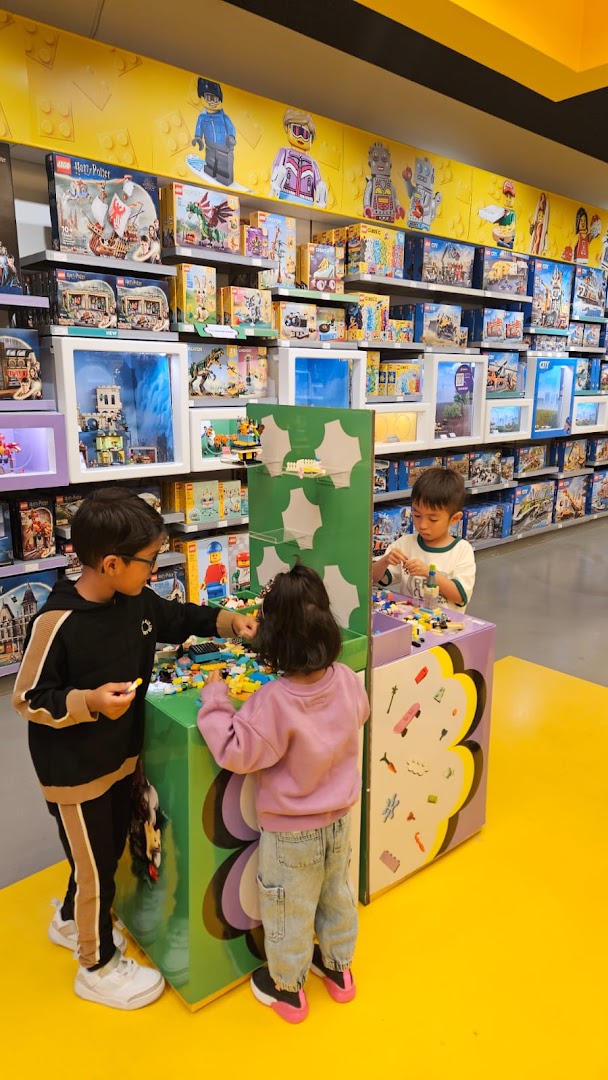 Children building with LEGO bricks at LEGO® Store London - Westfield